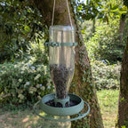 Mangeoire à oiseaux pour bouteille en verre de jus 1L T048 modèle "Le Silo" La Buse Qui File